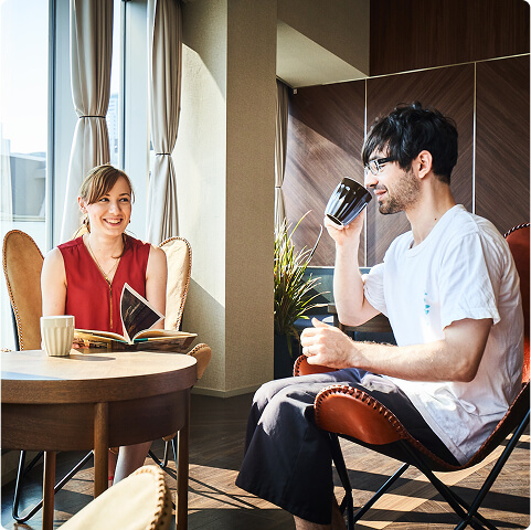 Guest relaxing with a cup of coffee